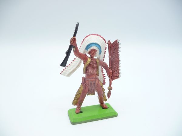 Britains Deetail Indian standing, rifle high with spear - long feather headdress