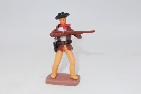 Plasty Cowboy standing shooting rifle