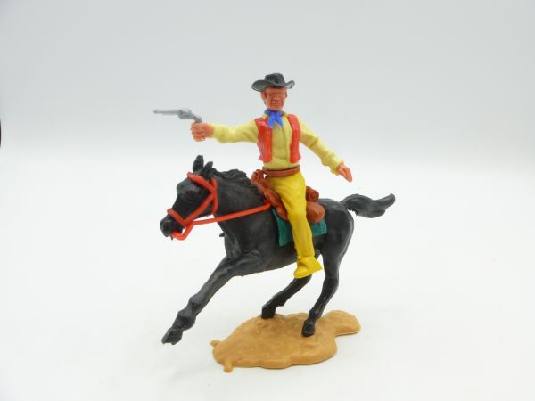 Timpo Toys Cowboy 3. Version reitend, Pistole schießend