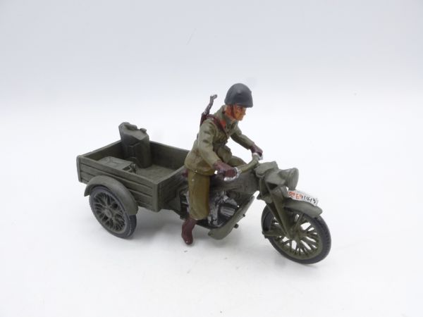 WW II soldier on motorbike with trailer