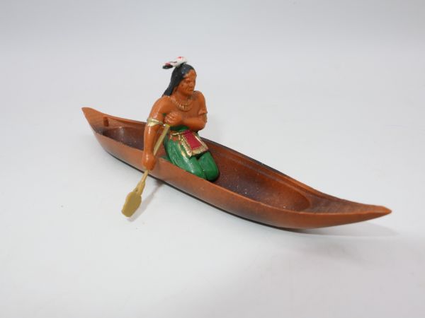 Clairet Indian in a canoe, paddling