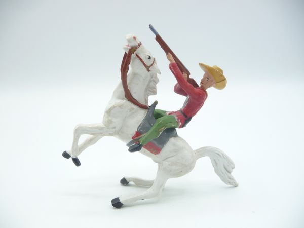 Merten Cowboy riding, firing rifle