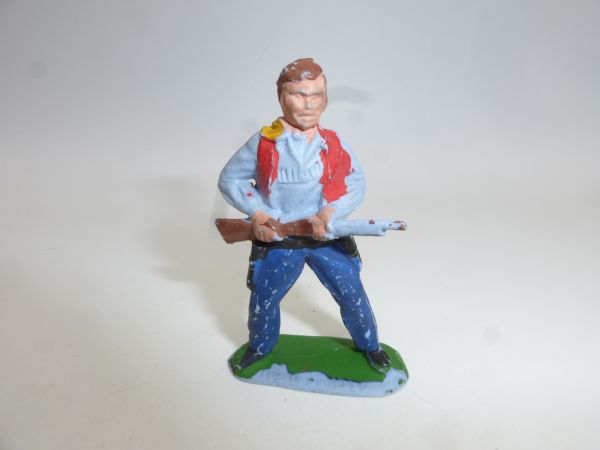 Timpo Toys Solid Cowboy, rifle at the ready, blue trousers
