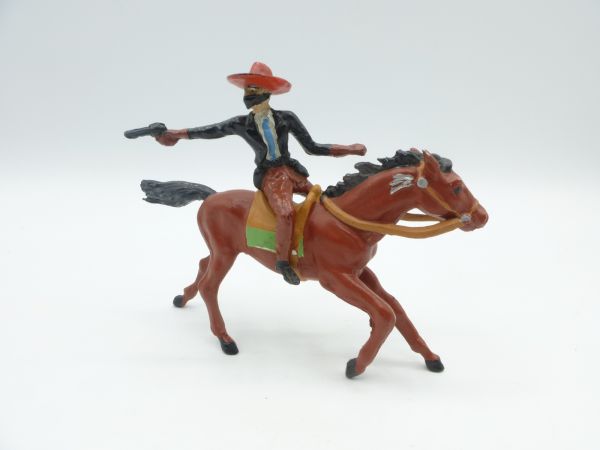 Merten Bandit riding, firing backwards