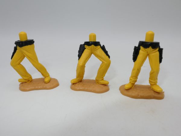 Timpo Toys 3 Cowboyunterteile, stehend, tiefgelb mit schwarzen Holstern