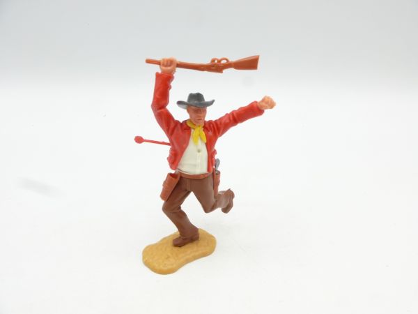 Timpo Toys Cowboy 2. Version laufend von Pfeil getroffen