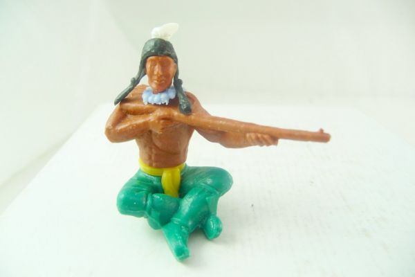 Timpo Toys Indianer sitzend, mit Gewehr schießend