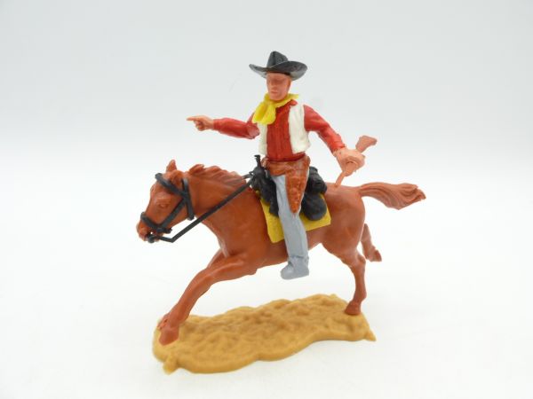 Timpo Toys Cowboy 2nd version riding with gun, pointing