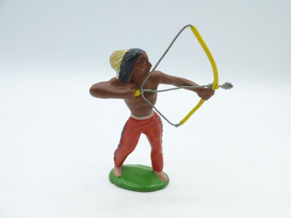 Indian with bow + arrow