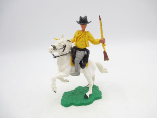 Timpo Toys Cowboy 1. Version (großer Hut) reitend mit Pistole + Gewehr