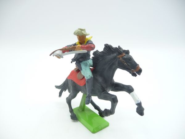 Britains Deetail US cavalryman riding with sabre + firing rifle
