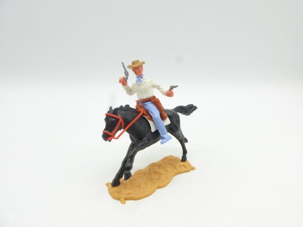 Timpo Toys Cowboy riding, shooting wild with 2 pistols