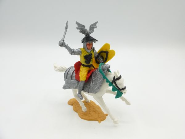 Timpo Toys Visor knight riding yellow/black with battle axe - on armoured horse