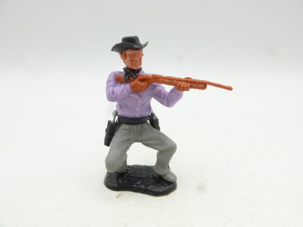 Timpo Toys Cowboy hockend, Gewehr schießend - tolle Farbkombi