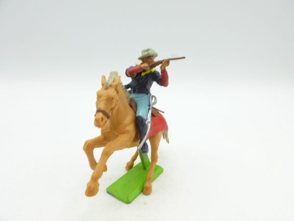 Britains Deetail Soldier 7th Cavalry on horseback, firing rifle sideways