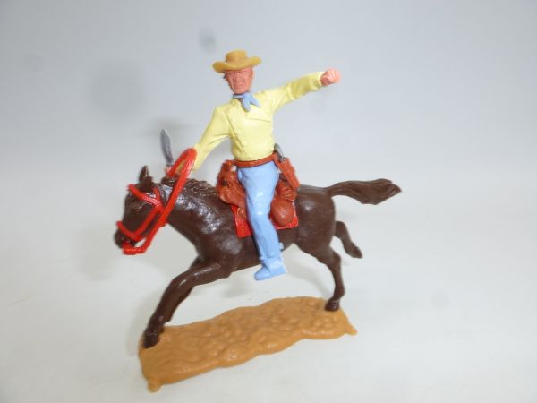 Timpo Toys Cowboy 3. Version (großer Kopf) reitend mit Messer