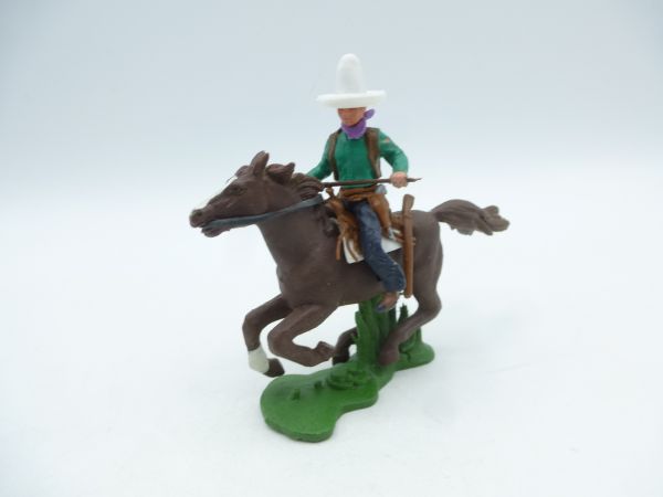 Britains Swoppets Cowboy riding with gun in front of his body - great horse