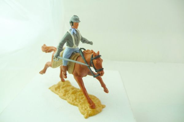 Timpo Toys Confederate Army soldier 3. version riding, holding sabre down (big head)