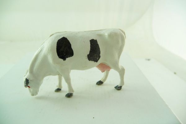 Reisler Cow grazing, white/black (hard plastic)