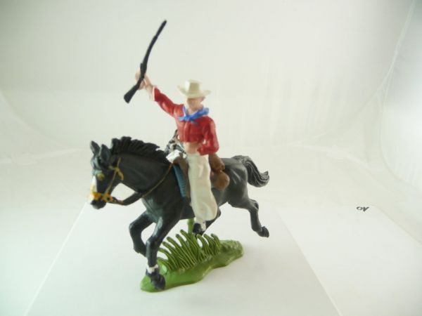 Britains Swoppets Cowboy riding, holding up rifle - great figure
