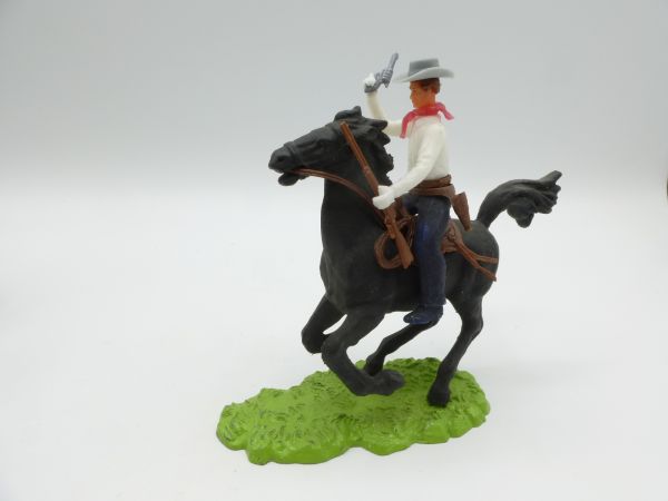 Elastolin 7 cm Cowboy riding with pistol + rifle