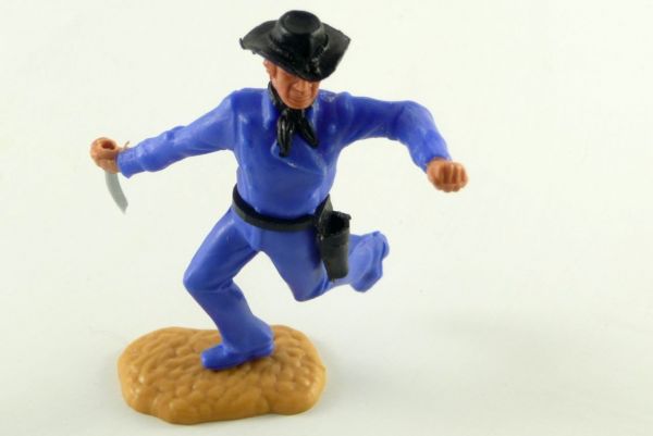 Timpo Cowboy mid-blue 3rd version running with knife
