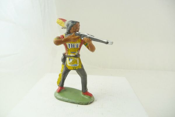 Leyla Indian standing firing with rifle - used good condition