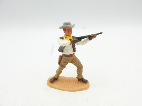 Timpo Toys Cowboy 4. Version stehend schießend, beige Hose