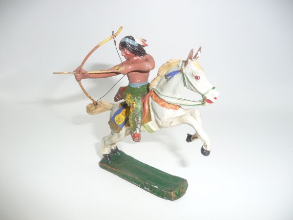 Elastolin Composition Indian on horseback shooting to the side with arrow + bow