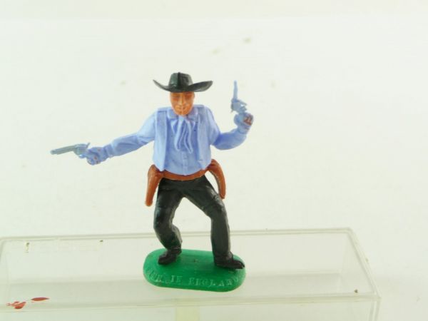 Timpo Toys Cowboy 2 Pistolen schießend, hellblau - sehr guter Zustand
