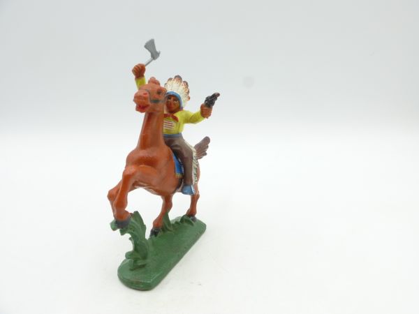 Indian on horseback with tomahawk + pistol