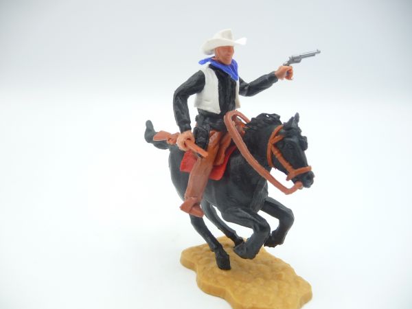 Timpo Toys Cowboy 2nd version riding with pistol + rifle - great colour combination