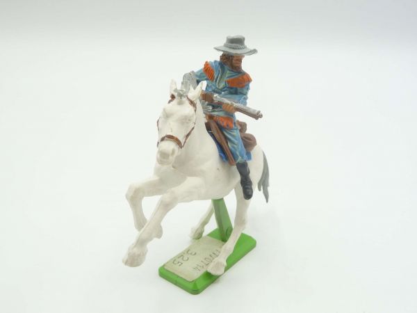 Britains Deetail Cowboy riding, rifle in front of the body - rare horse