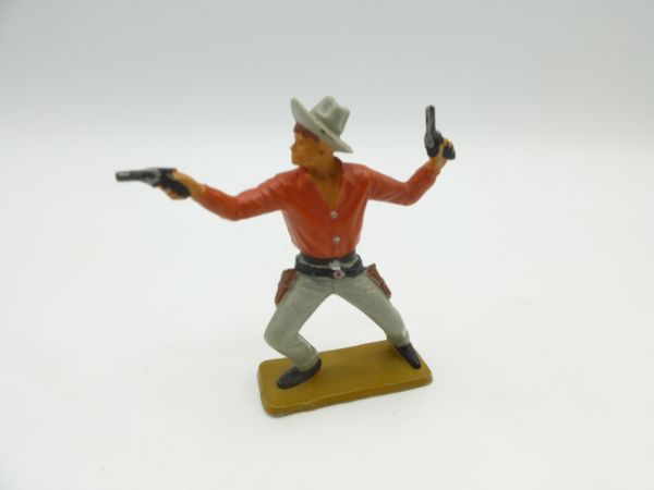 Starlux Cowboy stehend, 2 Pistolen wild schießend