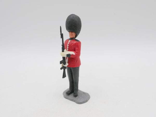 Timpo Toys Guardsman standing, presenting rifle