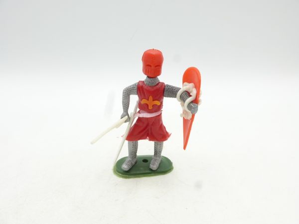 Medieval knight standing, red with sword