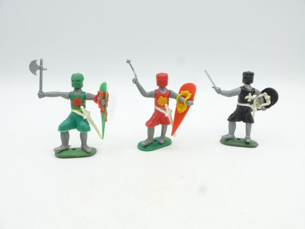 3 medieval knights on foot (green, red, black)