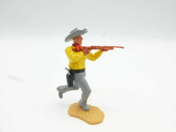 Timpo Toys Cowboy 3. Version laufend mit Gewehr, mit seltenem grauen Flachhut