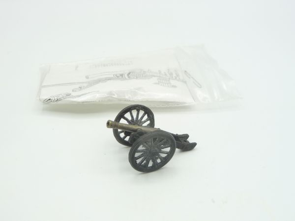 Small cannon made of metal (length 4 cm, width 2.5 cm)