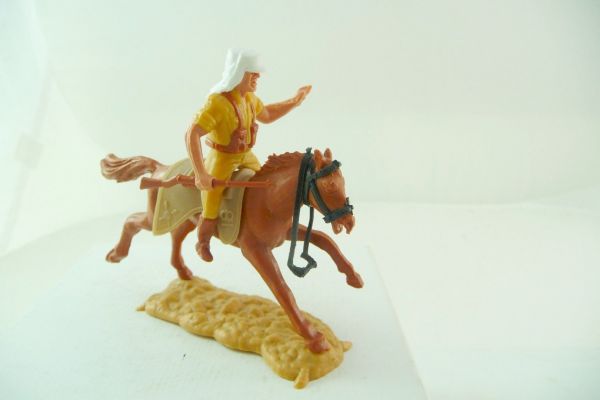 Timpo Toys Foreign legionnaire riding with rifle, pointing at side