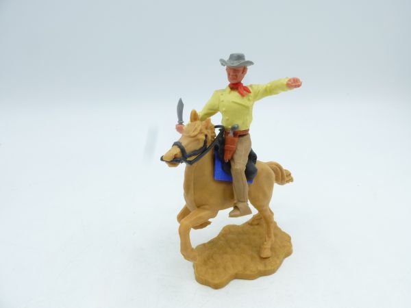 Timpo Toys Cowboy 3. Version reitend mit Messer