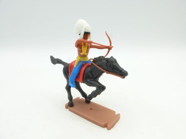 Plasty Indian on horseback, shooting bow