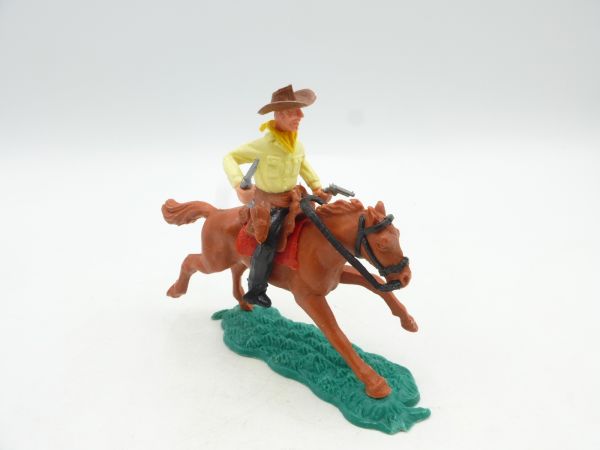 Timpo Toys Cowboy 2nd version riding, shooting 2 pistols