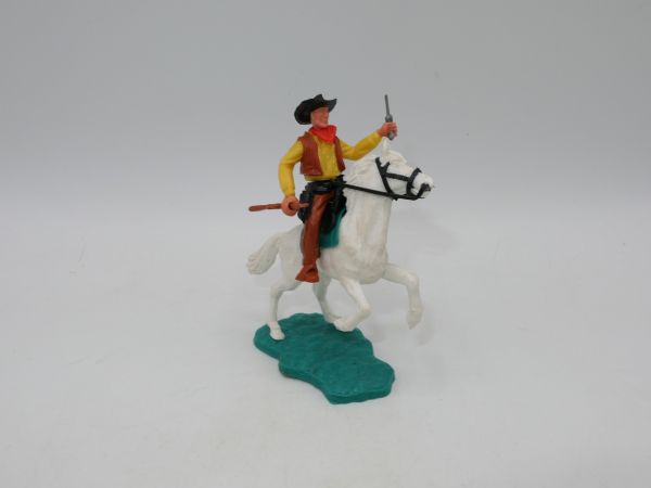 Timpo Toys Cowboy reitend auf schönem aufsteigenden Pferd