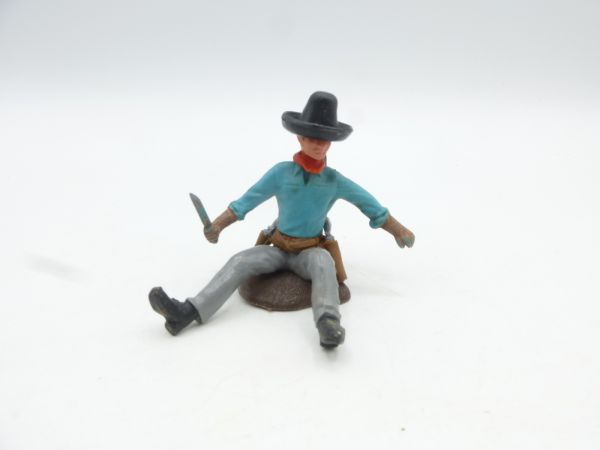 Britains Swoppets Cowboy sitting with knife