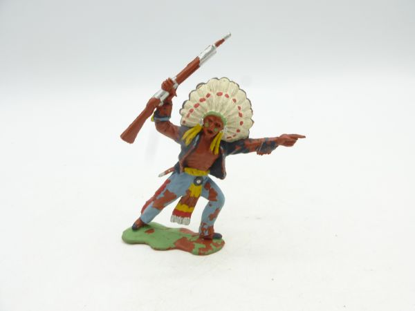 Britains Swoppets Indian with rifle above, pointing - early solid figure