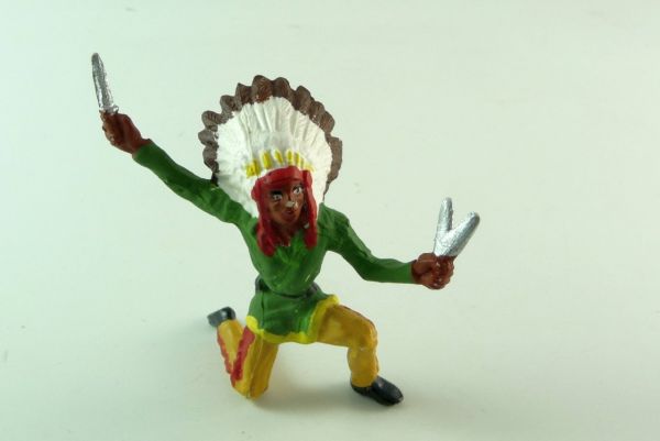 Merten Indian kneeling with knife