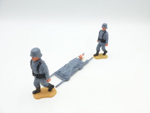Timpo Toys Deutsche Soldaten mit Verwundetem auf Bahre
