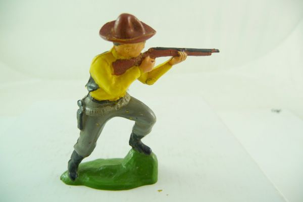 Reisler hard plastic Cowboy firing with rifle at side, black