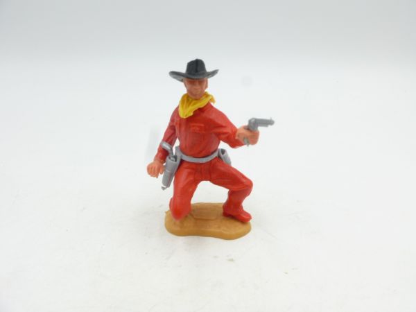 Timpo Toys Cowboy 2. Version hockend, Pistole schießend